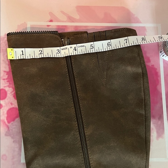 Not yet Rated- high heel boot is with zipper details. - Picture 10 of 11